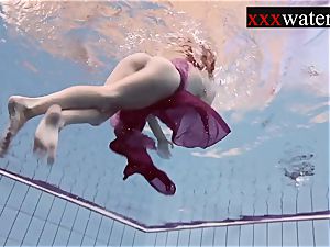 Smoking hot Russian red-haired in the pool
