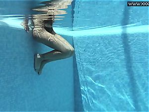 Tiffany Tatum strips nude underwater