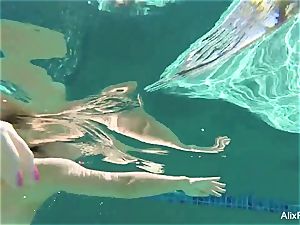 huge-chested blondes Alix and Cherie go skinny dipping