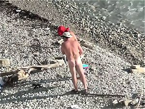 uber-cute youthful teenage nudists on the beach